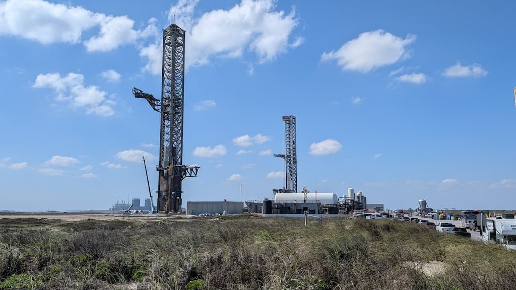 SpaceX Starship launch towers at Starbase, Texas, visible from Highway 4